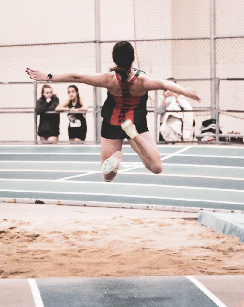 Josie Hopkins on Hopkinton sails through the air