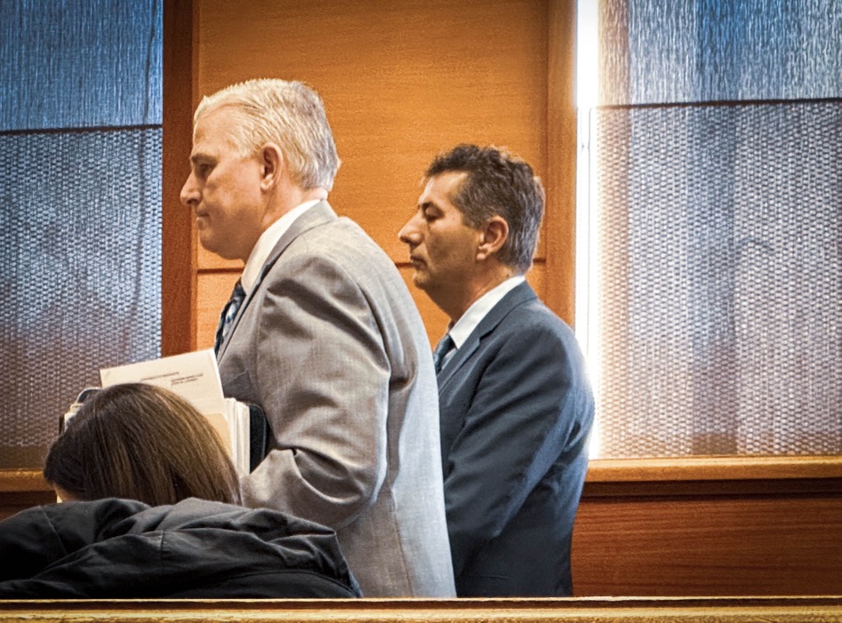 Peter Sismanis (R) and his attorney