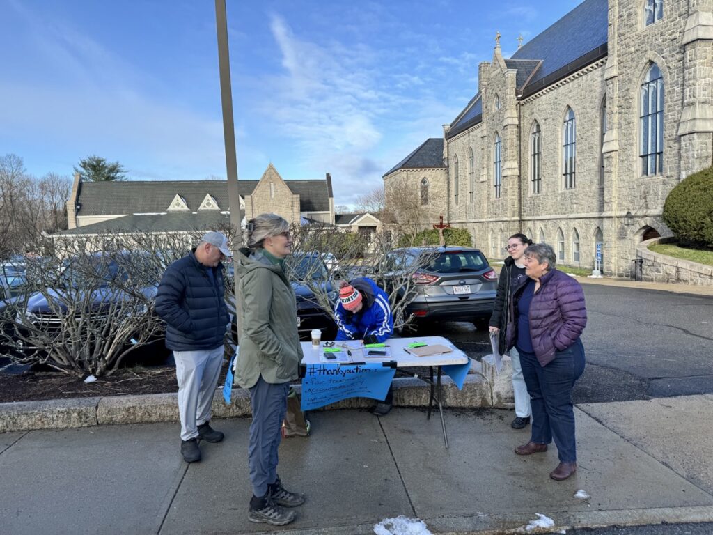 Organizers of the effort to recall the Select Board hold a friendly conversation with outgoing Board Chair Muriel Kramer, who was on-hand to collect signatures to support her run for Governor's Council.