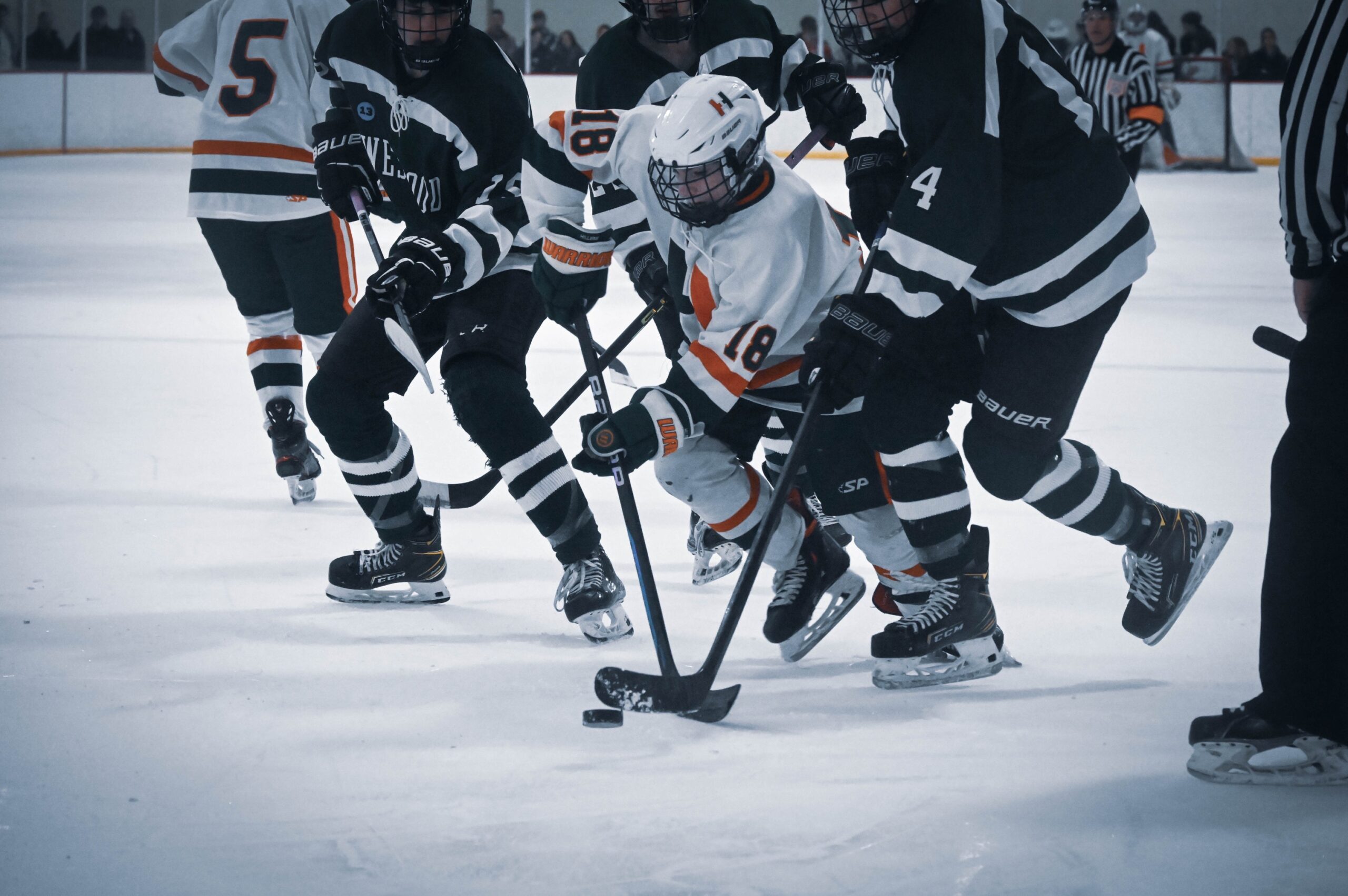 Cam MacPherson battles for the puck