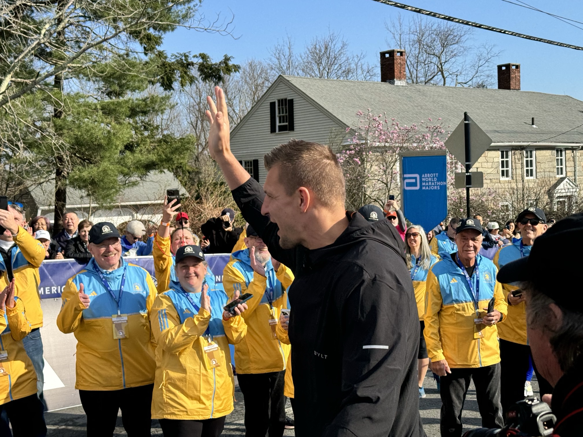 Grand Marshal a 4x World Champion Rob Gronkowski waves to the crowd.