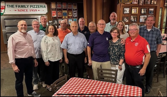 Group of people at a pizzeria