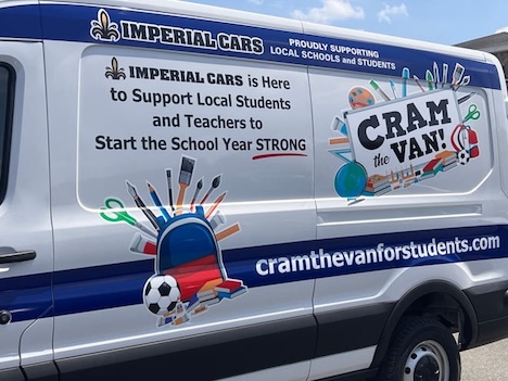 Van with "Cram the Van" written on the side