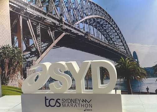 Bridge with a sign for the Sydney Marathon