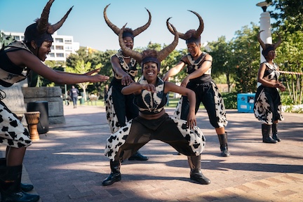 Dancers dressed as African animals