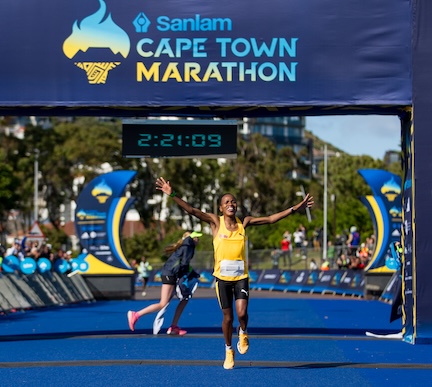 Woman finishing a marathon