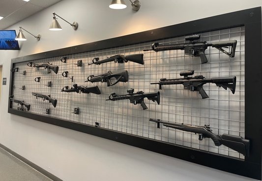Mass Firearms School where two individuals have been charged with October break-in.