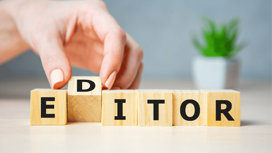 AI image of blocks spelling "editor."