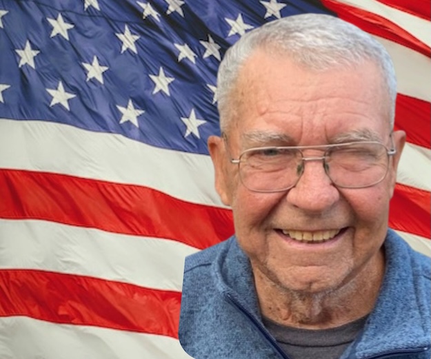 Veteran Bill Bowker with flag background